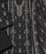 Black embroidered silk suit fabric closeup with shirt sleeves dupatta and trouser
