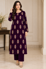 Woman wearing a deep plum velvet embroidered shirt with matching trousers in a front pose without dupatta