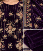 Closeup of deep plum velvet shirt handwork, embroidered shawl and velvet trouser