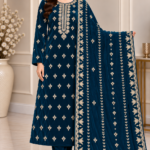 Deep teal velvet suit with embroidered shirt matching trousers and detailed dupatta