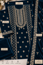 Deep teal velvet shirt with intricate gold neckline and lattice embroidery