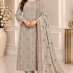 Light taupe velvet suit with embroidered shirt matching trousers and patterned shawl