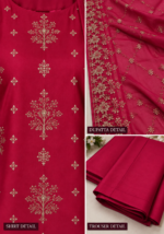 Magenta silk shirt closeup with intricate gold floral embroidery