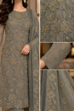 Close up of grey chiffon floral paisley embroidery with silver gold and amber embellishments